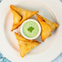 Vegetable Samosa (3Pc) · Peas, potatoes, onions mix with homemade spices folded into wrappers and deep fried.
