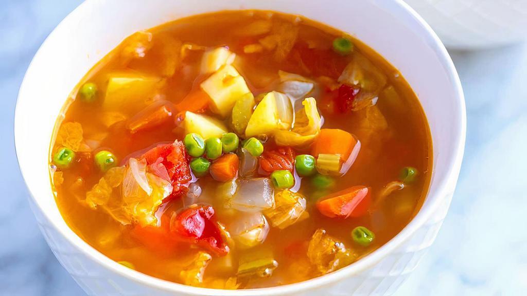 Hot & Sour Soup (Vegetables Or Chicken) · Hot and sour soup mixed with homemade spices.