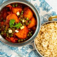 Aloo Matar · Cubes potatoes and green peas sautéed with Nepali spices. (Comes with side dish)