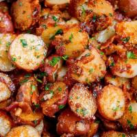 Hot Garlic Potatoes · Fried potatoes with garlic, chili sauce, sprinkled with green onions and sesame seeds. (Come...