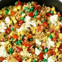 Mix Vegetable Fried Rice · Cooked rice that has been stir-fried and mixed with carrots, onions, green onions, peas, fre...