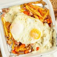 Matty’S Skillet · Eggs your way, diced ham, red bell pepper, onion over French fries and smothered in our coun...