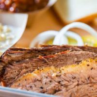Sliced Brisket Plate · Sliced smoked brisket, your choice of moist, lean or both . Comes with two 6oz sides, up to ...