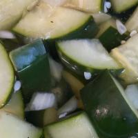 Cucumber Salad · -Vegan/ Gluten Free-
Chopped cucumbers, diced white onion, in an apple cider vinaigrette.