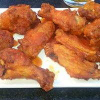 Wings · 10 large wings tossed in your choice of mild or spicy buffalo sauce, honey bbq, hoisin bbq, ...