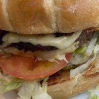 Spicy · Pepper jack cheese, shredded lettuce, tomato, pickled jalapeños, caramelized onions, and top...