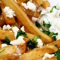 Greek Fries · Same cut size as French fries with a  homemade specialty garlic seasoning made with fresh ga...
