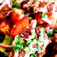 Falafel Salad · Homemade falafel (6 pieces). Staple Middle Eastern dish, crunchy mixture of chickpeas, crisp...