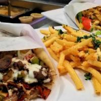 Gyro Pita Combo · With fries or  side of Greek salad and a drink.
