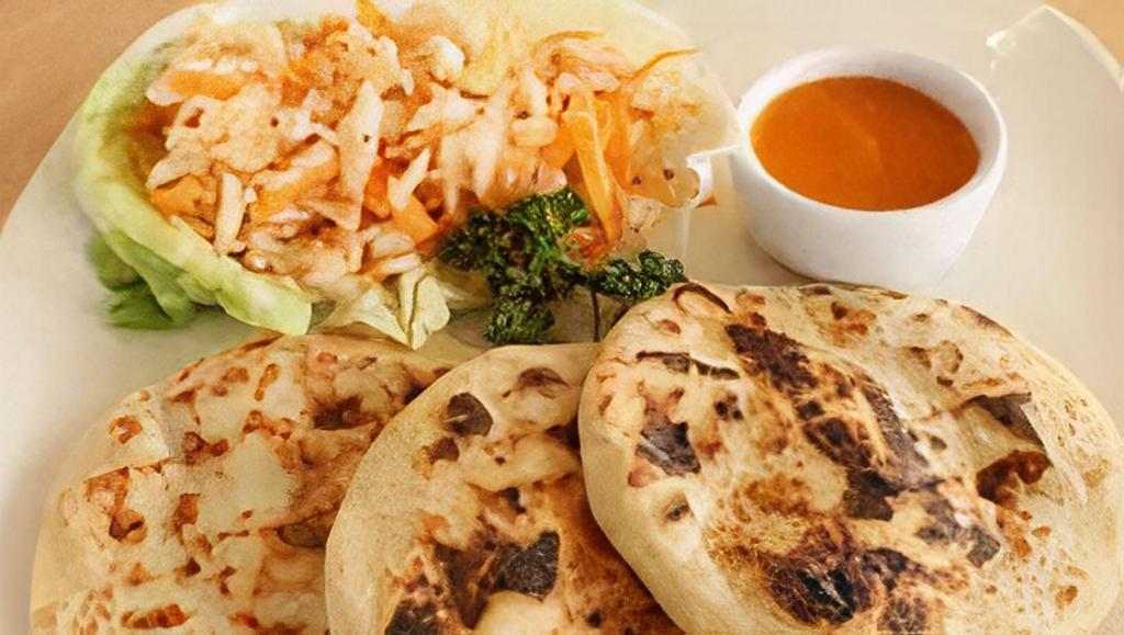 Pork Pupusas Meal · A Salvadoran dish made of a thick corn tortilla and stuffed with a savory filling of chicharrón (pork), pinto beans and Jack cheese. Handmade! Meal comes with 3 pupusas, one side (rice, beans, or chips) and a drink