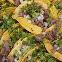 Street Taco Party Tray · 20 Street tacos on two soft corn tortillas with your choice of meat topped with onions and c...