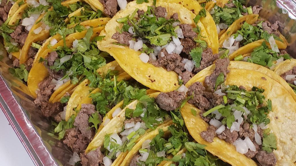 Street Taco Party Tray · 20 Street tacos on two soft corn tortillas with your choice of meat topped with onions and cilantro. VERY AUTHENTIC!!