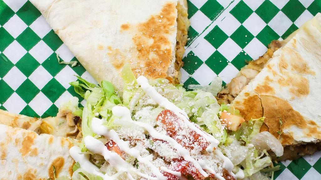 Quesadilla With Meat · A big flour tortilla with Jack cheese, your choice of meat and your one side choice (rice, beans, chips or house salad)