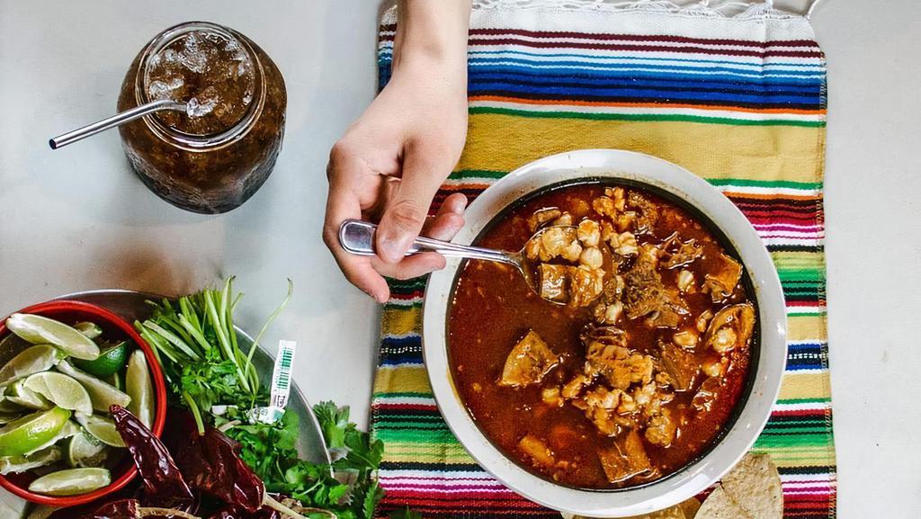Menudo · Now served every day cause those who MENUDO know can be craving it or hang over any day. Served with warm bread, onions, cilantro, and lime on the side.