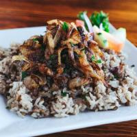 Majadra · Brown lentil jasmine rice topped with caramelized onions. VGN GF