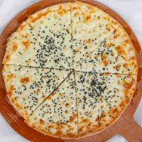 Lebanese Sesame Cheese Pizza · Mozzarella cheese, black sesame seeds, and parsley.