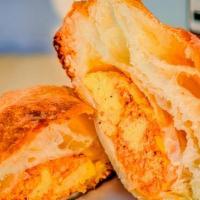 Chorizo & Egg (Pack Of 8) · Spicy pork sausage, fluffy scrambled eggs, and cheddar cheese loaded in a puff pastry and ba...