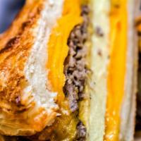 Sausage & Egg Croissant · Fluffy scrambled eggs, cheddar cheese and your choice of a sausage patty or a half serving o...