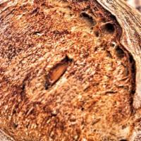 Rosemary Garlic Sourdough · An intensely flavorful sourdough made with whole garlic cloves slow roasted in olive oil, ro...