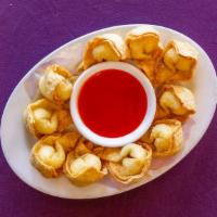 Crab Puffs (10) · Fried wonton wrapper with cream cheese filling