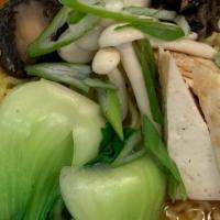 Shoyu Miso Ramen. · Fresh ramen noodles, wild mushroom broth, Enoki, pickled shiitake, kikurage, steamed tofu, b...