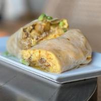 Breakfast Burrito · Organic handmade flour tortilla, scrambled eggs, asadero cheese, duck fat fried potatoes, ho...