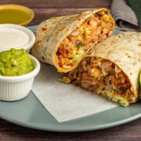 Tata Burrito · Rice, pinto beans, veggies or meat, pico de gallo, cheese, sour cream, guacamole lettuce, an...