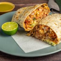 Nito Burrito · Rice, pinto beans, veggies or meat, pico de gallo, cheese, lettuce, and salsa.
