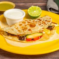 Quesadillas · Flour tortilla, cheese, veggies or meat, cilantro, onion, and salsa.