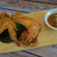 Chicken Wing · Marinated chicken wings in our ingredients then deep-fried and served with sweet & sour sauce.