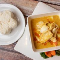 Yellow Curry · Yellow curry paste with coconut milk, cashew nuts, carrot, potato, onion, and bell peppers.