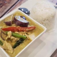 Green Curry · Green curry paste with Coconut milk, eggplant, bamboo shoots, bell peppers and Thai Basil.