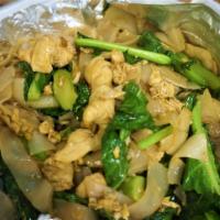 Phad See Ew · Stir-fried wide-rice noodles with egg, broccoli and carrots.