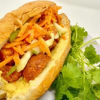 Vegan Meatball Baguette Sandwich · Served with cucumber, carrot, jalapeños, and cilantro. Vegan.