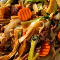 Combination Chow Fun · Combination of seafood, beef, chicken, and mixed vegetables chow fun served with soft stir-f...