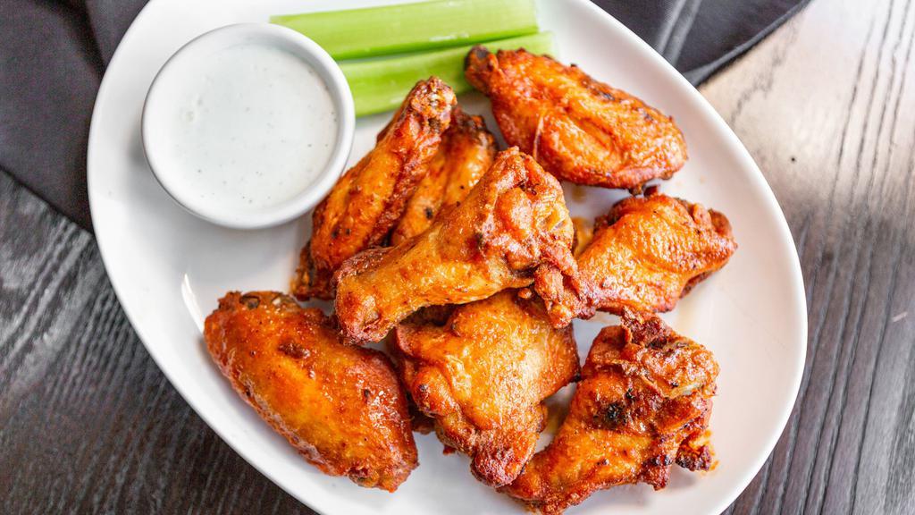 Wings · Bone-in tossed in your choice of sauce from honey glazed BBQ, fire, sweet chipotle, pineapple teriyaki, Thai chili, buffalo, and garlic butter sauce. Served with ranch or blue cheese dressing.