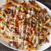 Loaded Bbq Fries · Loaded burnt-end cheesy fries with four different kinds of cheese, bacon, green onions, and ...