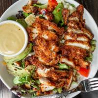 Fried Chicken & Avo Salad · Hand-breaded fried chicken, bacon, avocado, artichoke hearts, tomato, Cheddar, and Jack chee...