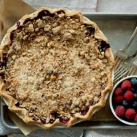 Bumble Berry Peach Pie-Slice · Raspberries, blueberries, marionberries & peaches w/ coconut hazelnut streusel *contains haz...