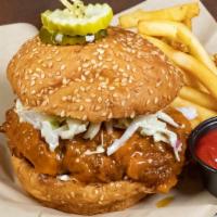 Nashville Hot Chicken Sandwich · Buttermilk fried chicken, hot sauce, pickles, coleslaw, mayo, sesame seed bun
