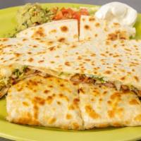 Quesadillas · Flour tortilla filled with your meat choice or just cheese. Served with sour cream and guaca...