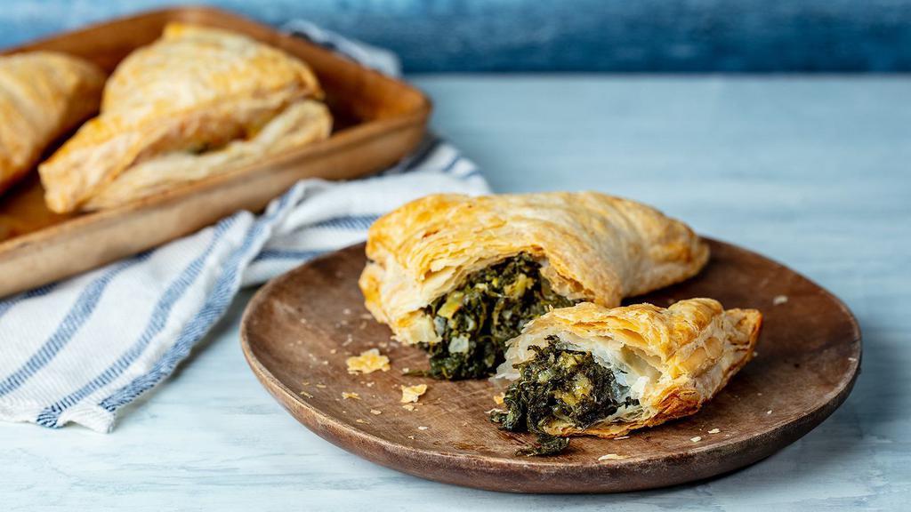 Spanakopita · Spinach and Feta Cheese in a Flaky Puff Pastry