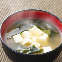 Miso Soup · Soy bean broth with tofu, seaweed and scallions.
