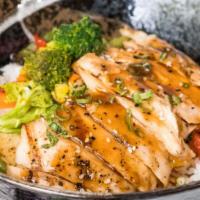 Teriyaki Bowl · Grilled chicken, beef or salmon (+1.00) with sauteed vegetables over a bed of rice.