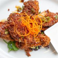 Asian Fried Chicken · Free range red bird farms chicken fried in a Japanese panko crust and topped with a secret h...
