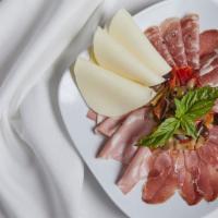 Antipasto All’Italiana  · Italian specialty meats with provolone cheese, olives, grilled and marinated vegetables.