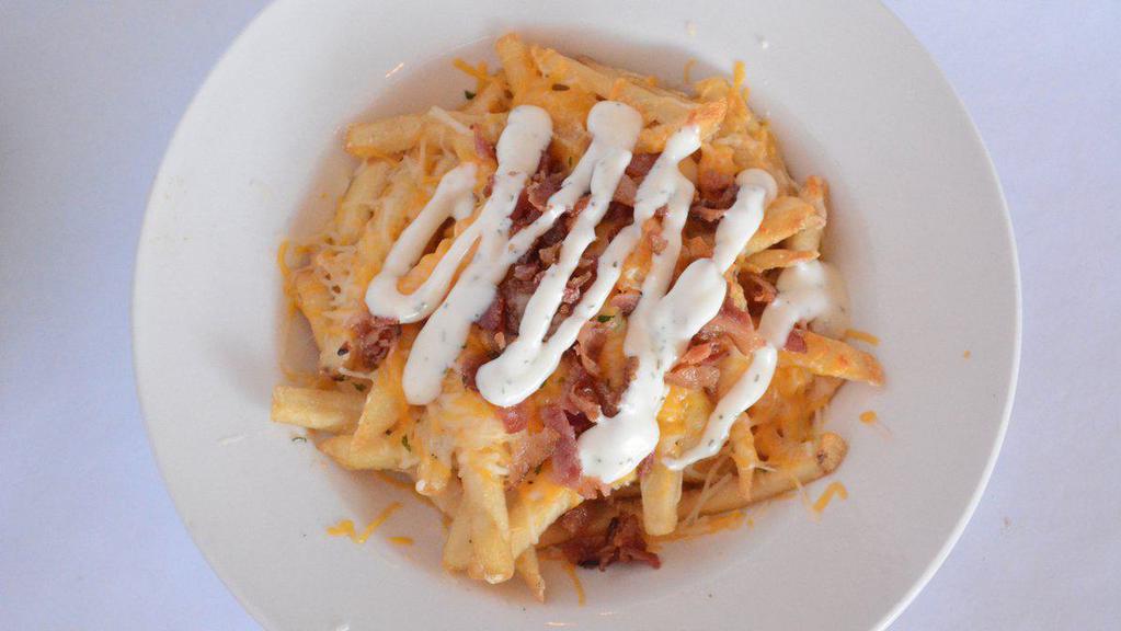 Bacon Cheese Fries (Half Pounder) · Regular fries, Cheddar/Jack cheese, applewood smoked bacon, drizzled with ranch.