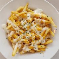 Cheese Fries (One Pounder) · Regular fries, melted Cheddar/Jack cheese, drizzled with ranch.