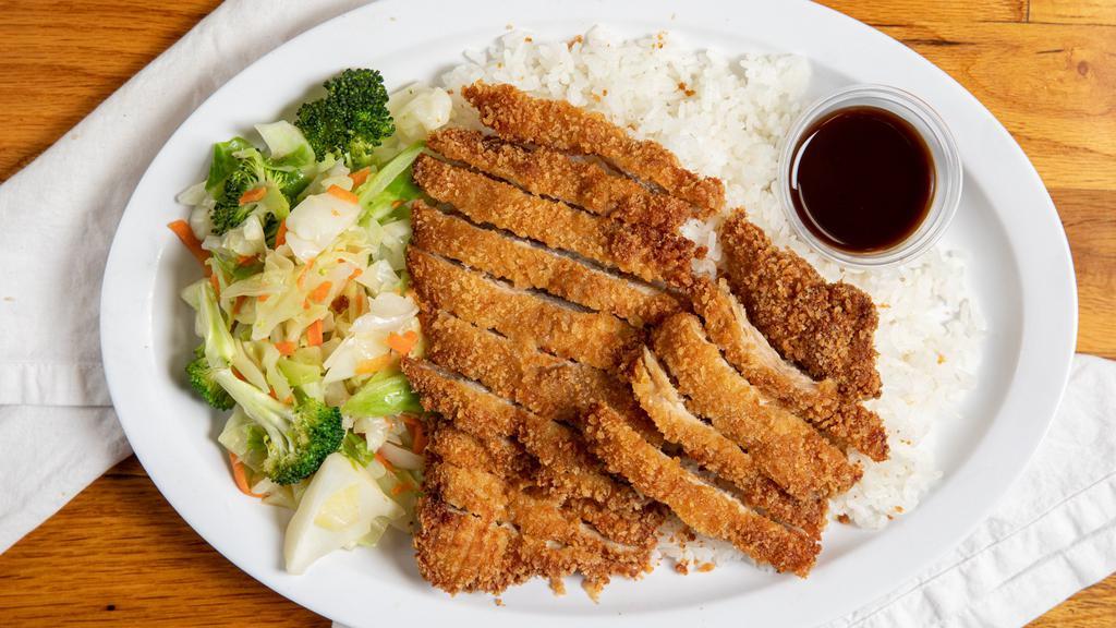 Chicken Katsu · Breaded and deep fried chicken served with steamed rice and veggie.