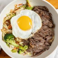 Bibimbop · Beef, egg, mixed veggie (pan fried), over steamed rice with our special sauce.